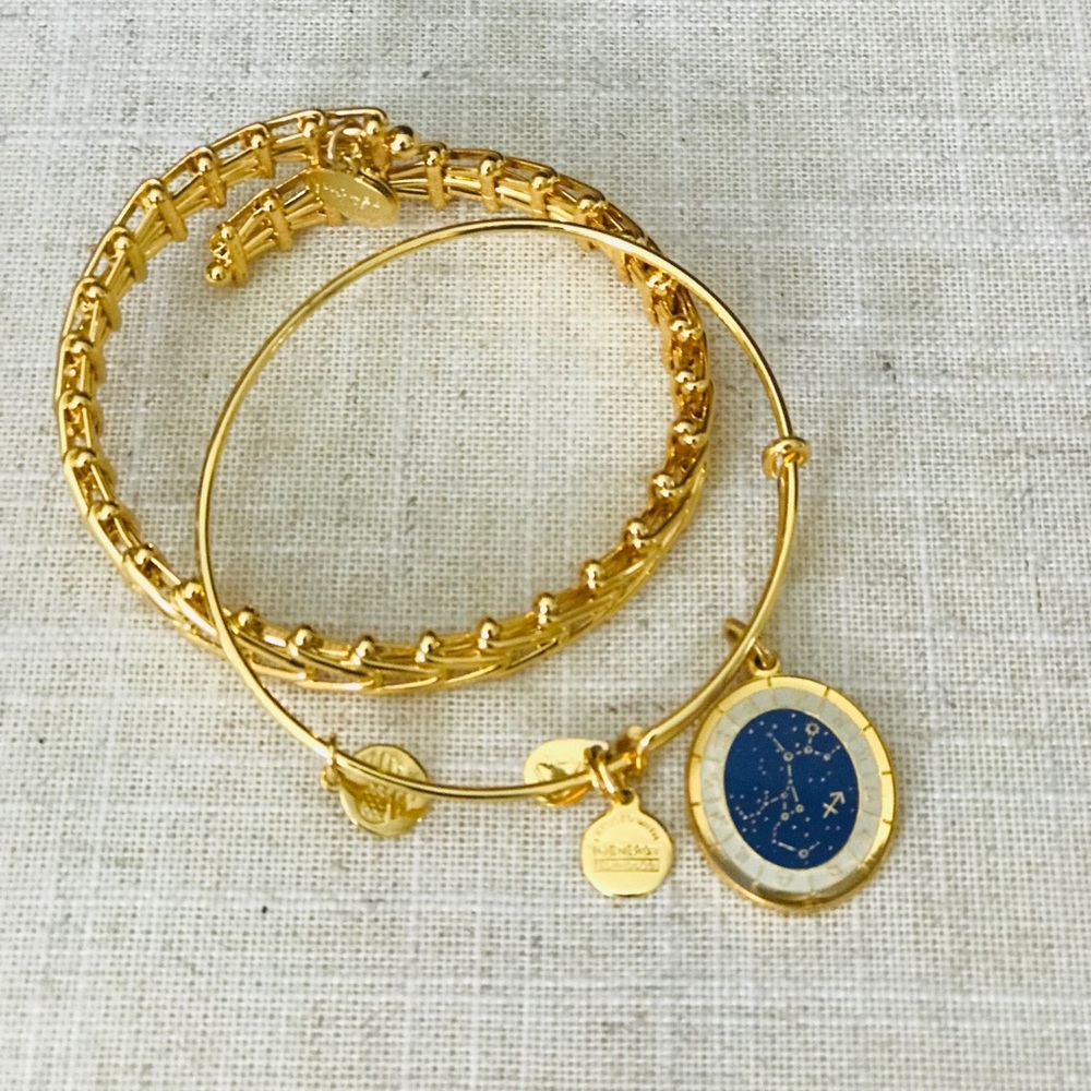 Alex and Ani gold bracelets.